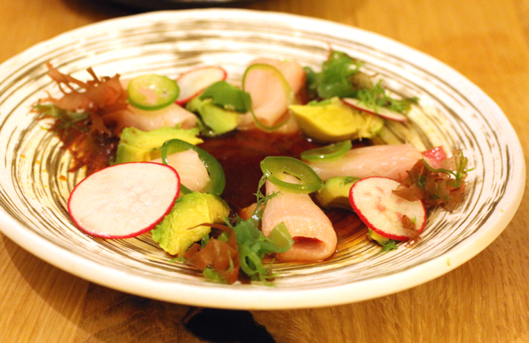 Delicious hamachi in a warm ponzu dressing.