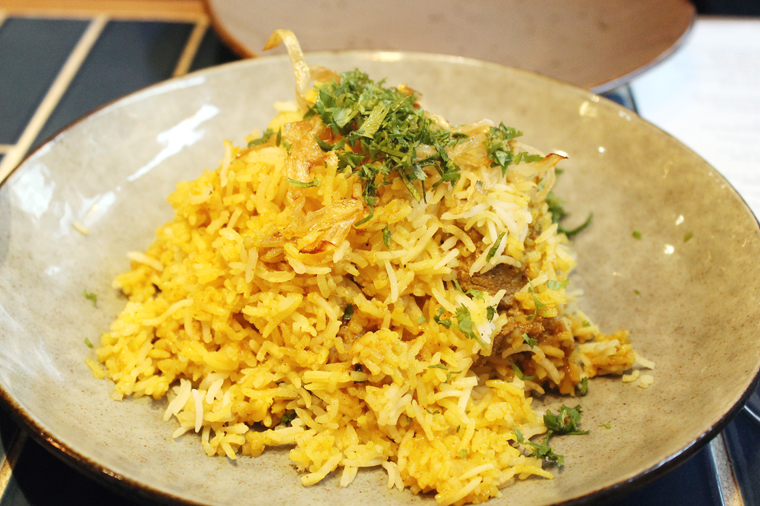 A mountain of Basmati with tender chunks of lamb.