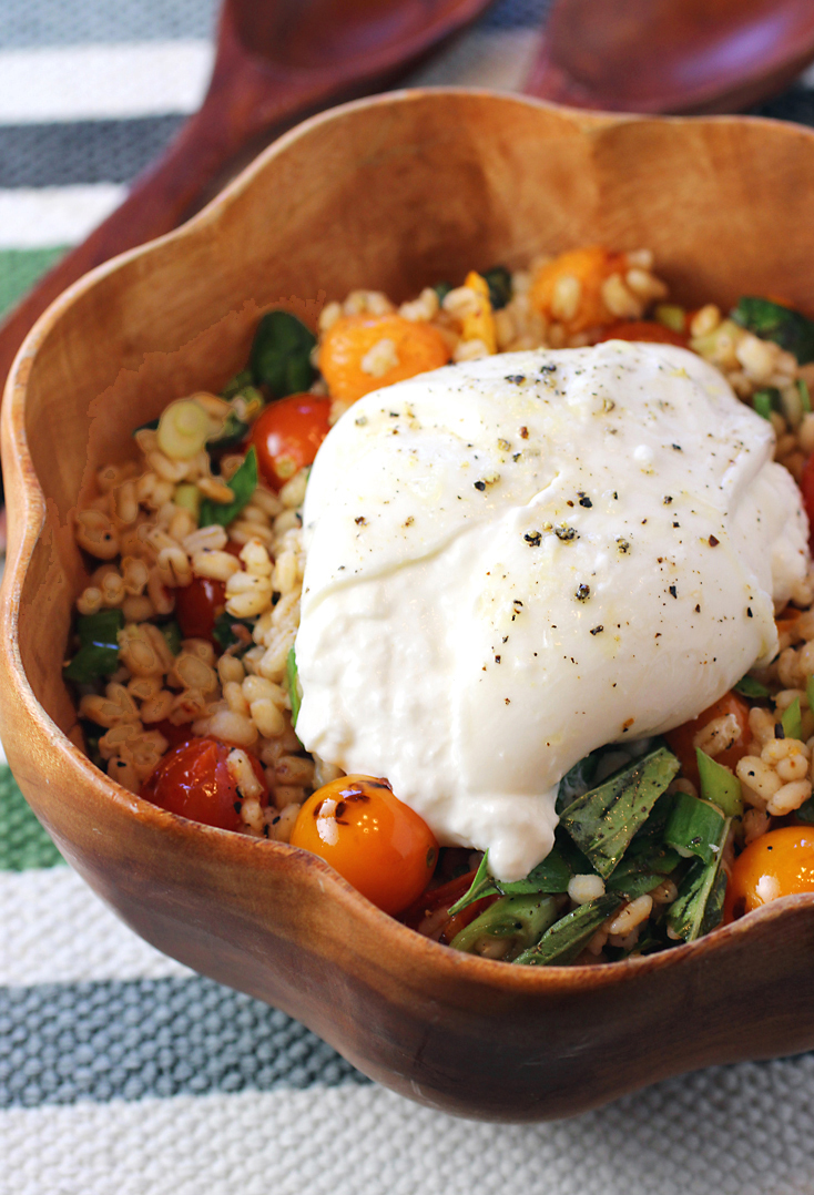 Milky sweet burrata is the crowning touch on this smoked barley-charred tomato salad.