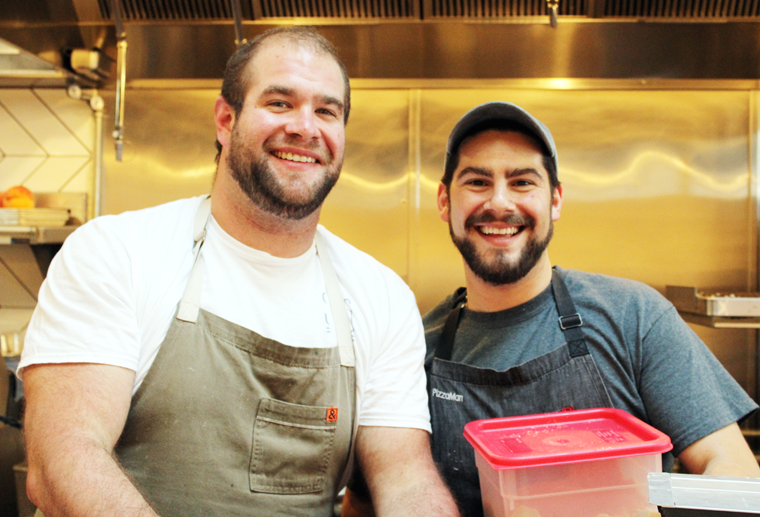 Danny Stoller (left) and Marc Schechter (right) in the kitchen of the first restaurant to call their own.