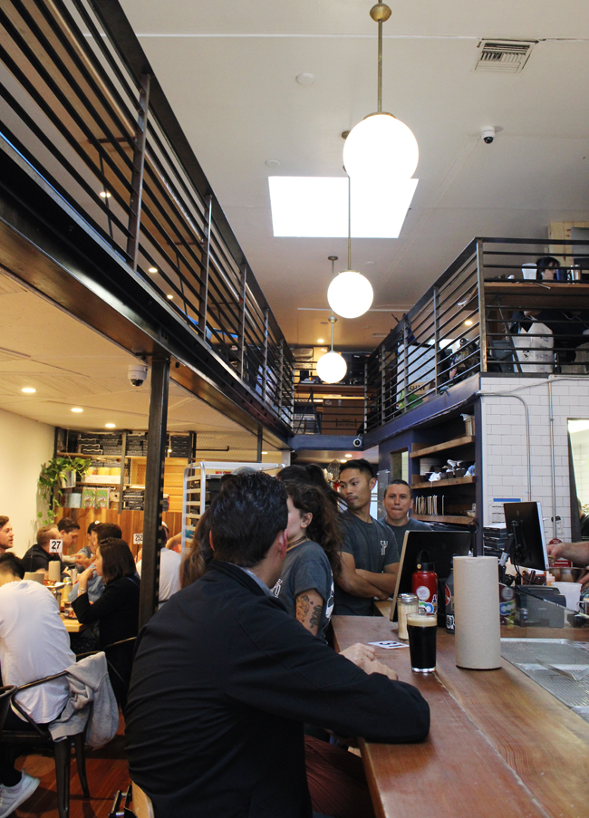 The dining room with mezzanine seating above.