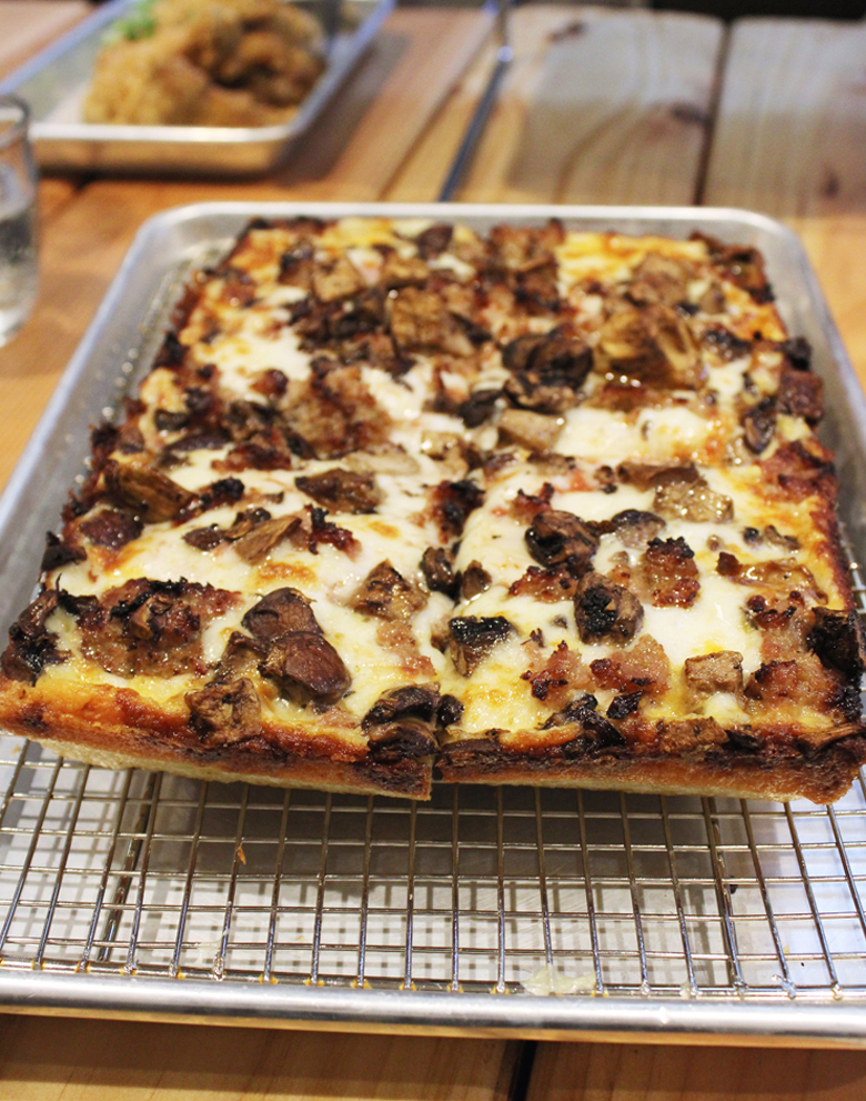 Sausage and mushroom pizza take a fun square turn at Square Pie Guys in San Francisco.