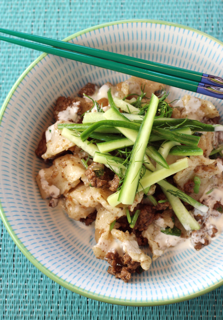 Chewy, rustic hand-made noodles with cumin lamb, dill, cucumbers, and a drizzle of sour cream.