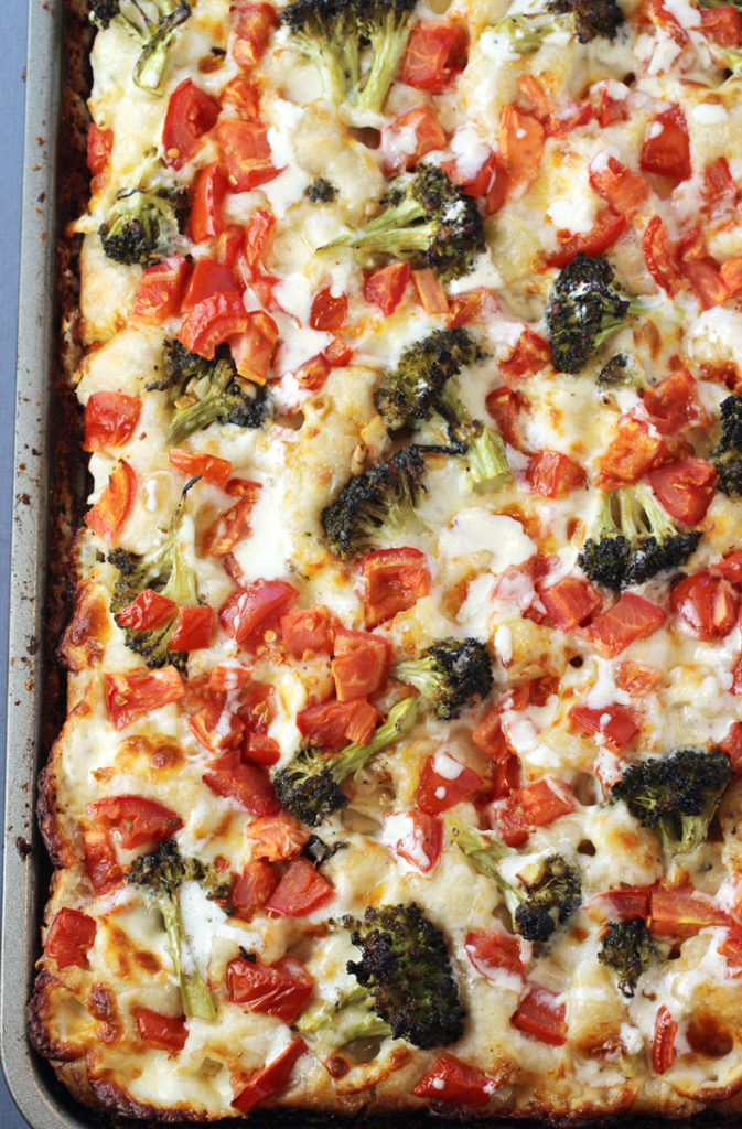A thick, focaccia-like crust forms the foundation for this veggie pan pizza.