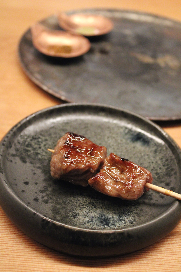 Charcoal-grilled skewer of the flat-iron of Hokkaido A5 Wagyu Snow Beef.