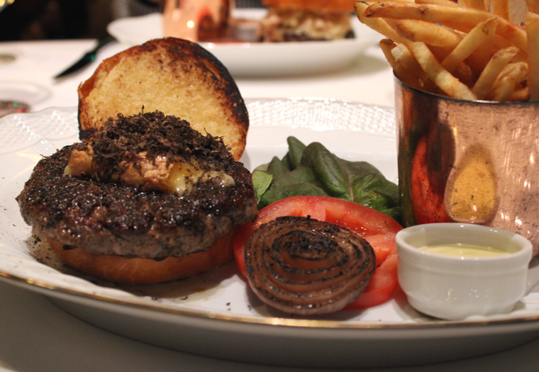 The Black Label burger arrives open-faced so you can get a direct whiff of all the black truffle shavings.