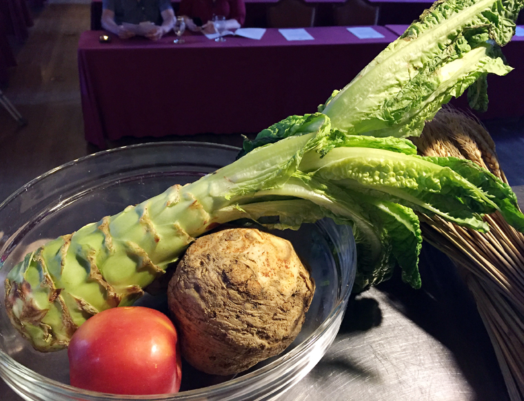 An apple and celery root overshadowed by the intriguing looking celtuce.