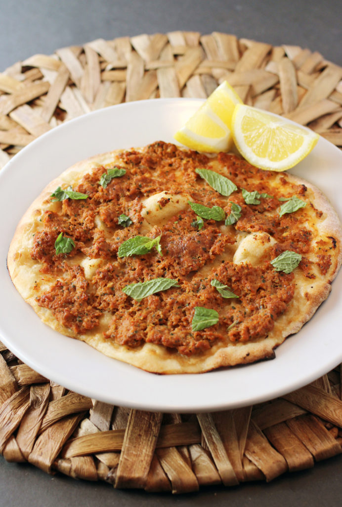 Get a taste of Armenian pizza -- topped with a flavorful lamb-tomato mixture.