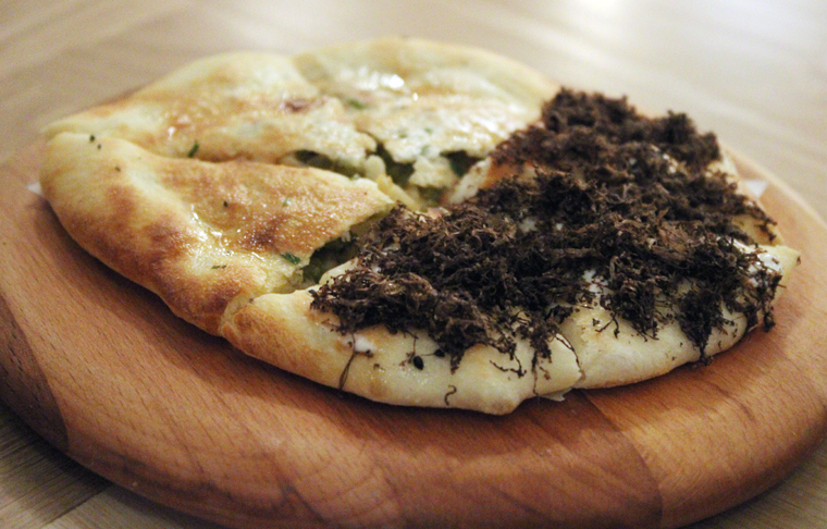 Kulcha with jalapenos (left) and truffles (right).