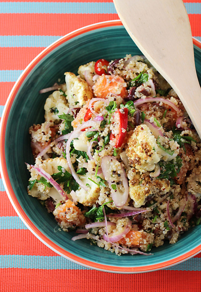 Quinoa with cauliflower, olives, oranges, and herbs -- a dish for good times and more challenging ones.