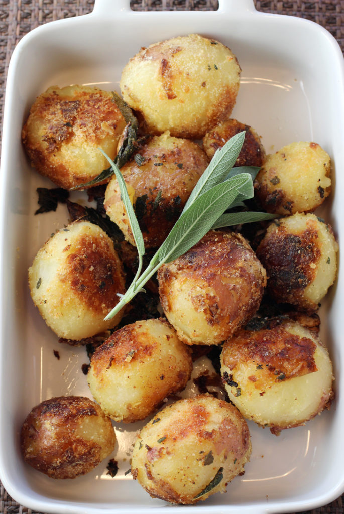 Crusty, crispy and divine -- who can resist these semolina-dusted potatoes?