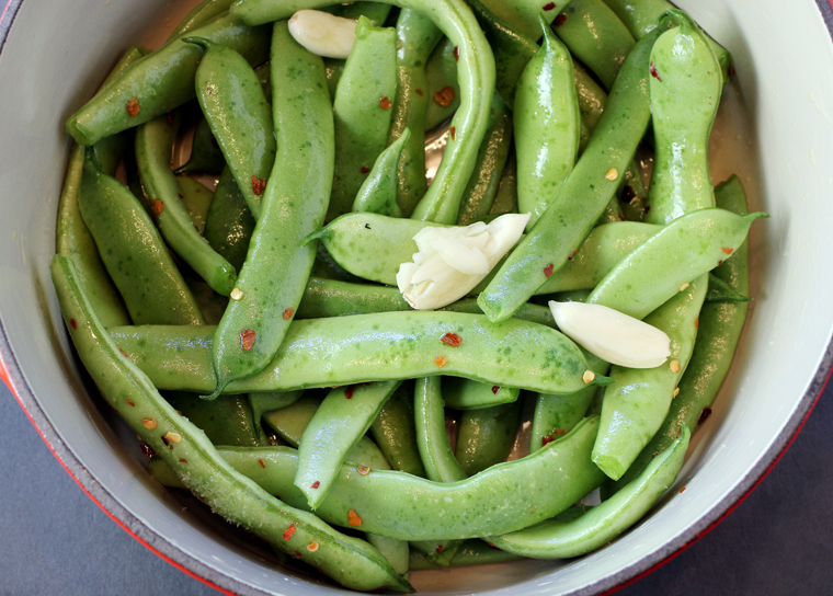 They go in the pot with garlic, chili flakes, and olive oil.