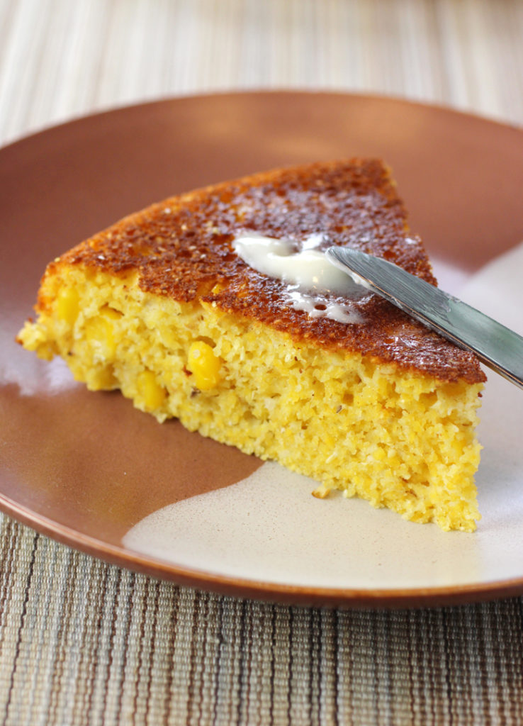 Cornbread made with cornmeal, corn kernels, and...