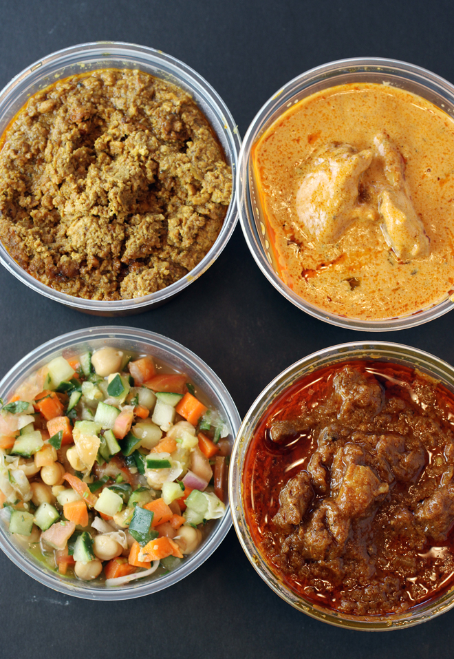 (Clockwise from top): Chicken keema, chicken tikka masala, lamb curry, and pickled vegetable salad.