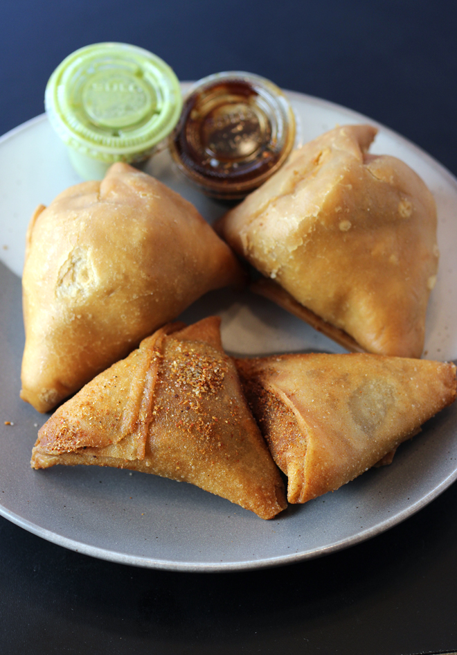 Zareen's chicken samosas (front), and potato samosas (back).