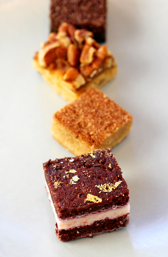 (Front to Back): The Blondery's Red Velvet, Cinnamon Sugar, Pecan and Salted Caramel, and Brooklyn Blackout blondies.