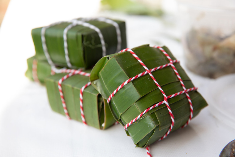 Festive packages of sticky rice dumplings. (Photo courtesy of the Banh Chung Collective)