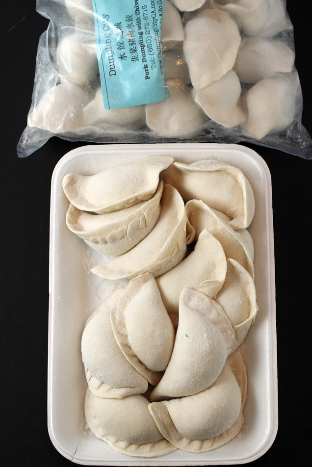 The dumplings come uncooked, and mostly frozen.