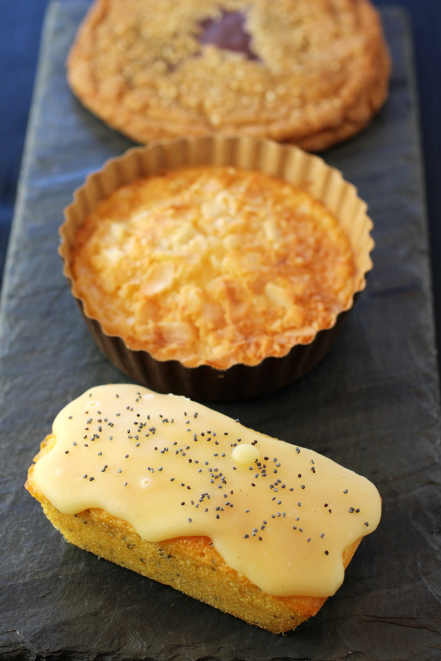 (Front to back): Lilikoi poppyseed loaf, butter mochi, and chocolate tahini cookie.