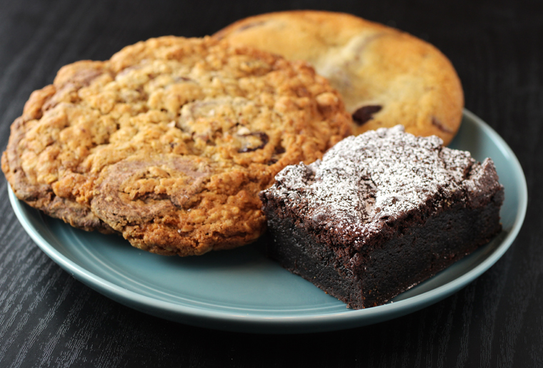 (Clockwise from left): Cowboy cookie, chocolate chip cookie, and dark chocolate brownie.