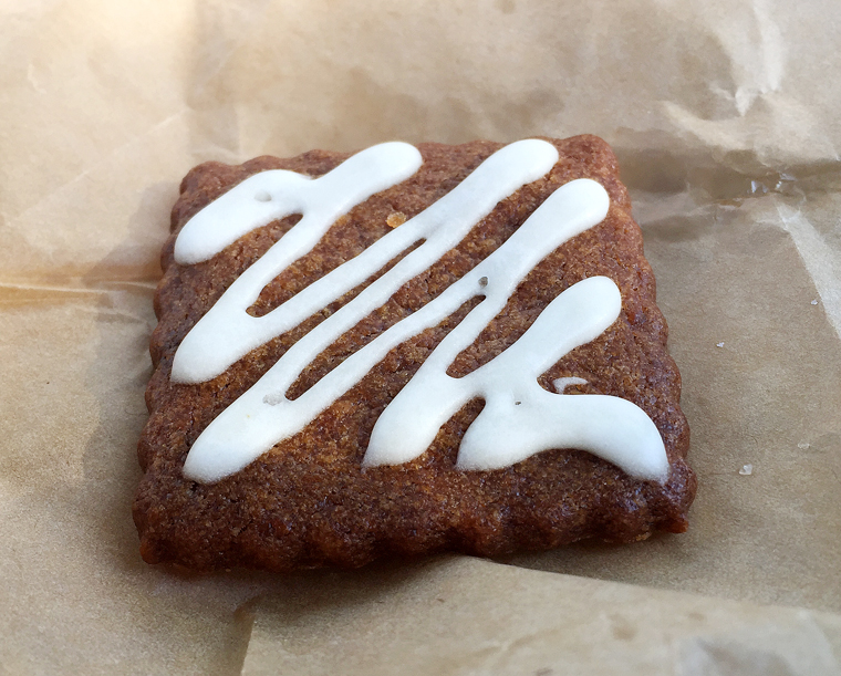 A dainty little cookie neatly wrapped in parchment is included in the fried chicken sandwich lunch box.