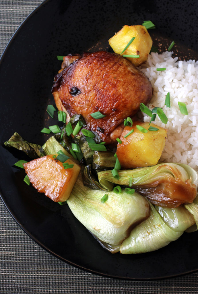 Chicken gets marinated in soy sauce, then roasted on one pan with fresh pineapple and baby bok choy.