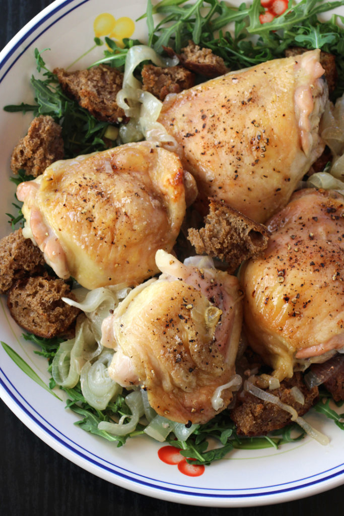 A "no-recipe'' recipe of crispy-skin chicken on a bed of caramelized onions and shallots, with arugula and home-made croutons.