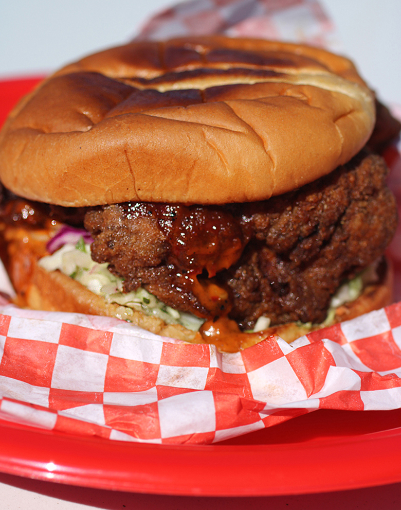 Mel Canares' fried chicken sandwich -- photographed on the hood of my car. 