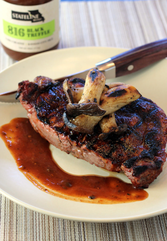 Grilled steak and mushrooms get elevated with Stateline Road BBQ Truffle Sauce.