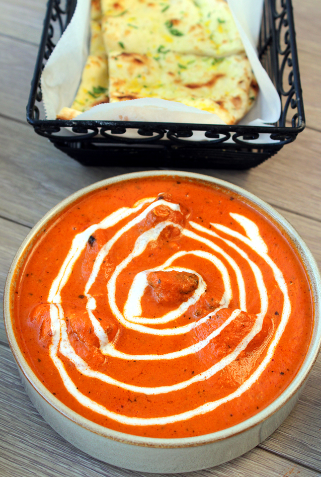 Heavenly "Old Delhi-Style Butter Chicken'' with roomali roti in the background.