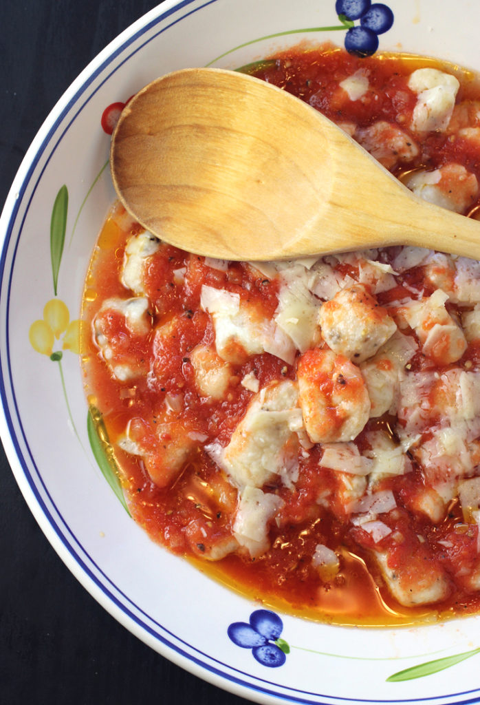 Pillowy ricotta gnocchi in a fresh and lively tomato sauce.