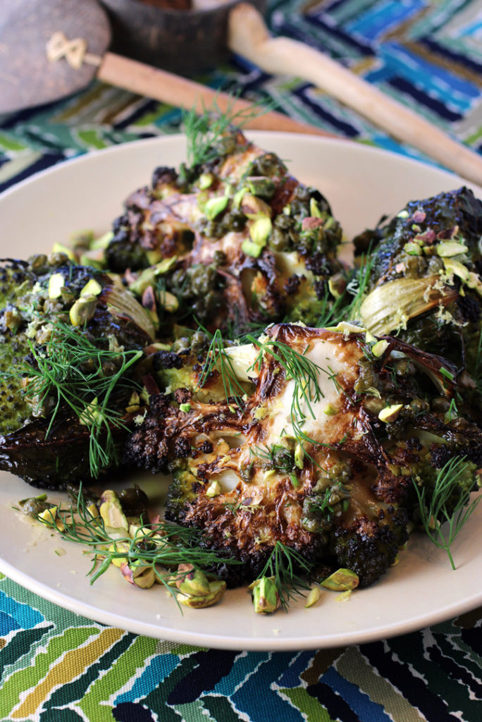 Par-boiling before roasting results in deeply bronzed and crisp Romanesco halves.