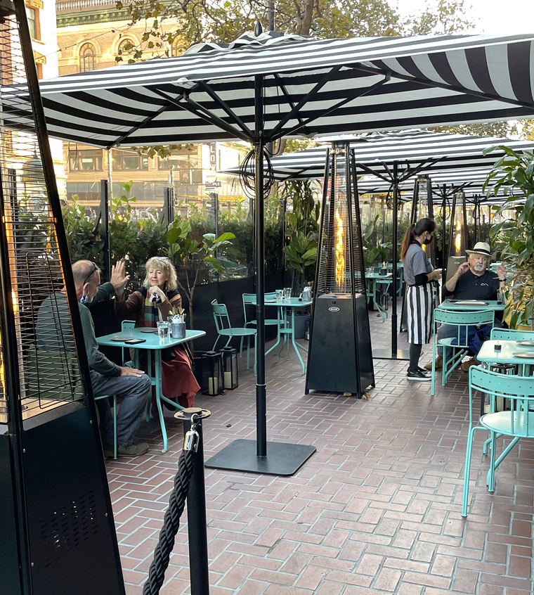 La Bande's outdoor dining is right on Market Street. But plenty of plants and plexiglass walls dampen down the hubub.