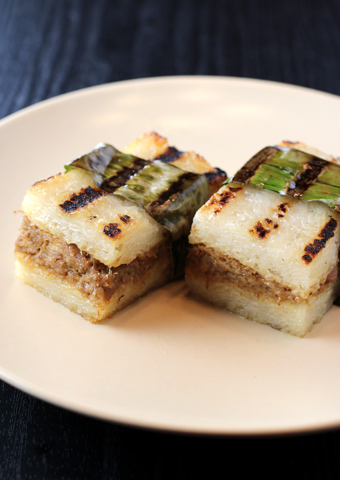 Musubi-like sticky rice cakes with shredded chicken.