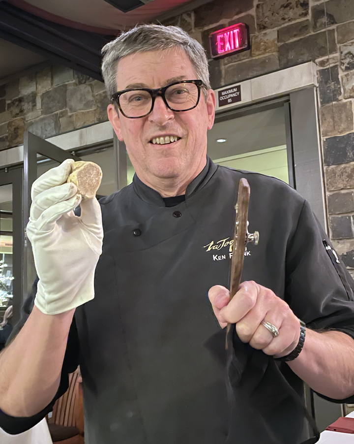 Chef Ken Frank with white truffle in hand.