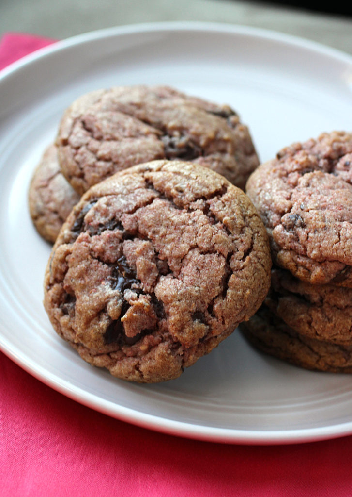 Freeze-dried raspberries get pulverized and mixed into the flour for this dazzling take on chocolate chunk cookies.