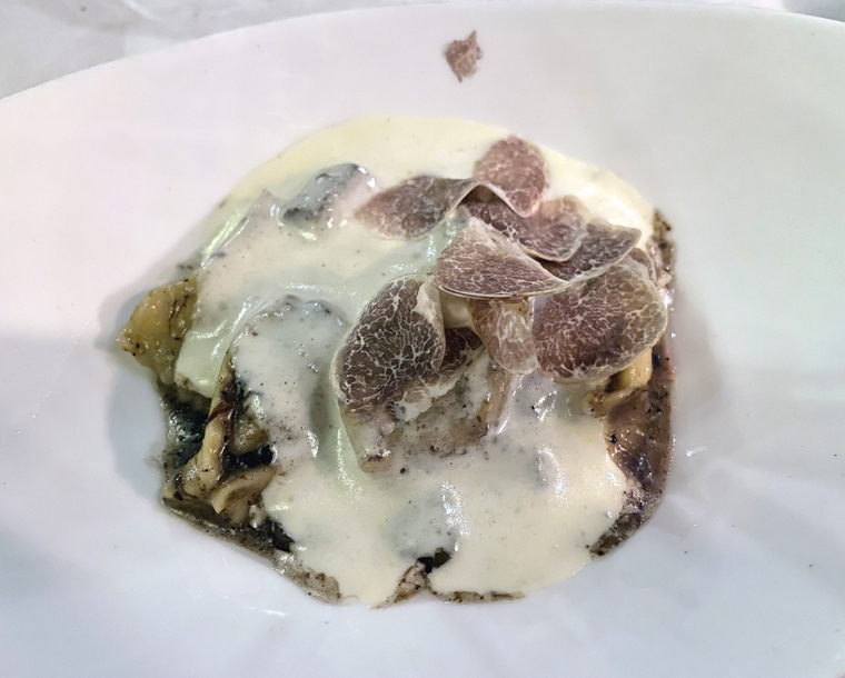Agnolotti with truffles over the top.
