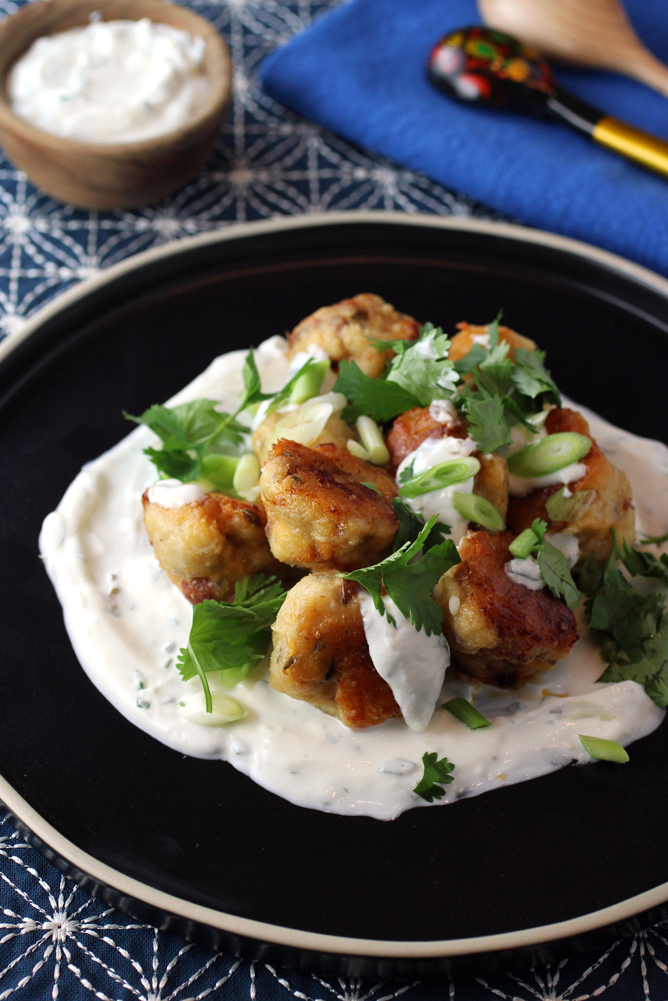 A creamy, zesty and cooling herb-yogurt sauce is the final touch.