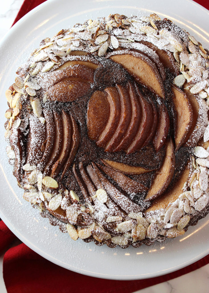 Treat yourself to this beautiful chocolate-almond-pear tart. You deserve it.