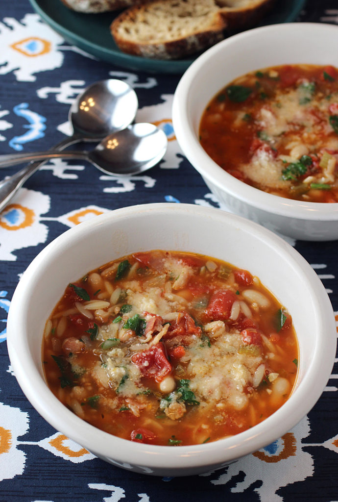 This satisfying orzo-cannellini bean soup gets a lift from tinned anchovies.