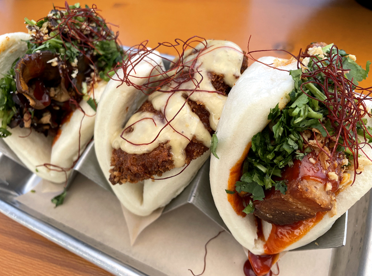 Another view of the baos (left to right: smoked mushroom, fried chicken, and gochujang-glazed pork belly).