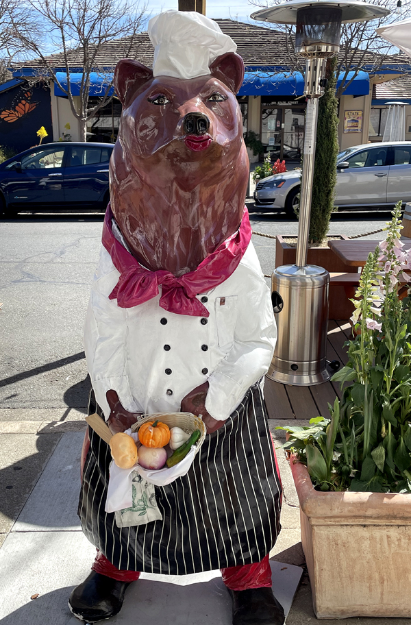 The bear that greets you at the front of State Street Market.