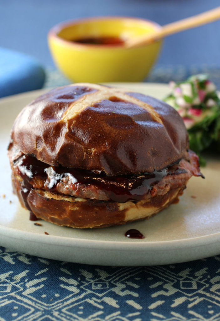 A tangy-fruity pomegranate molasses barbecue sauce finishes these juicy lamb-beef burgers.