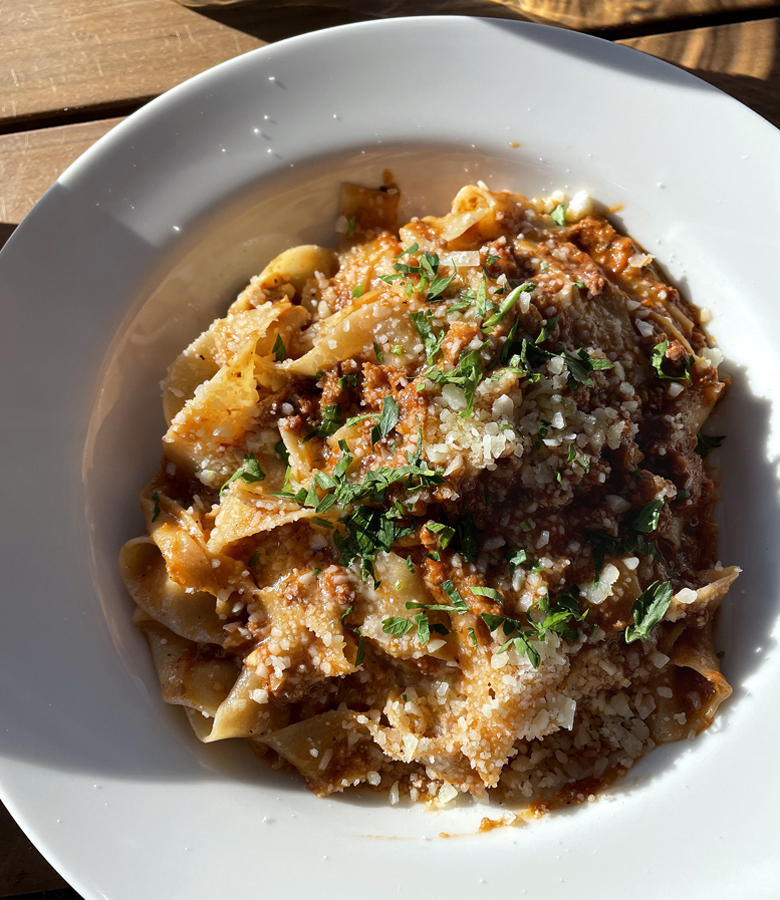 House-made pastas like this fettuccine bolgonese star at Howie's Artisan Pizza.