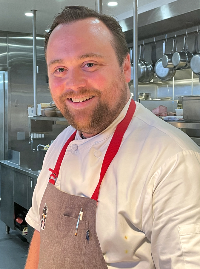 Chef Brandon Rice in the open kitchen at Ernest, the first restaurant that's his own.