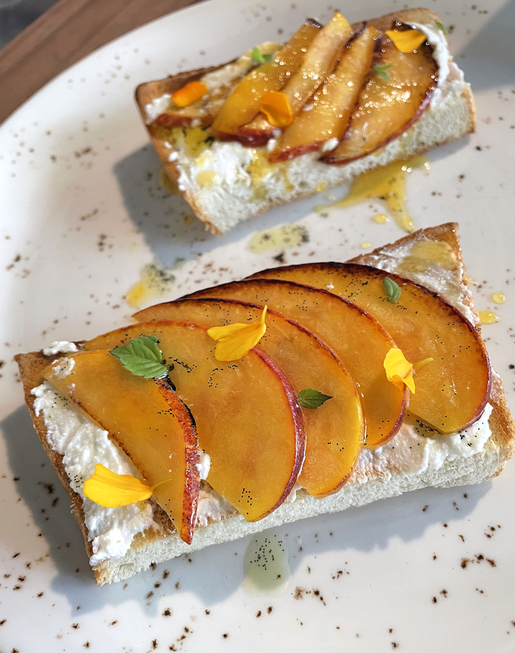 Milk bread toast with peaches and ricotta.