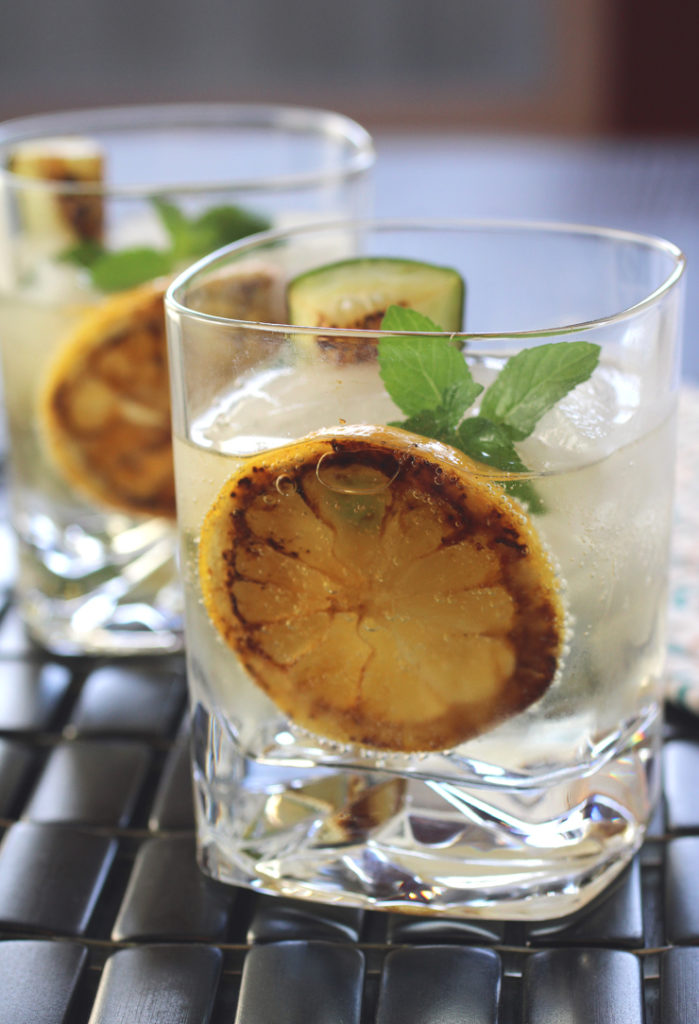 Char some lemon and cucumber to make a gin & tonic extra special.