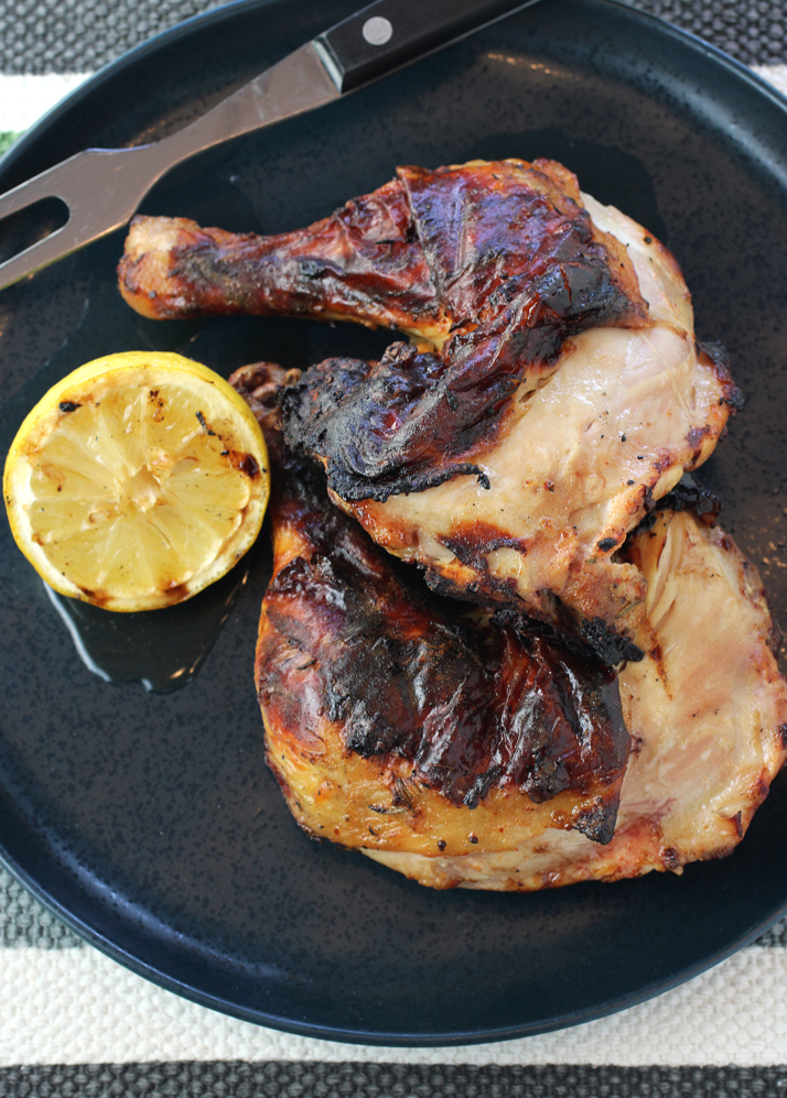 Grill your lemon halves, too, to add another layer of tangy flavor when squirted over the chicken.