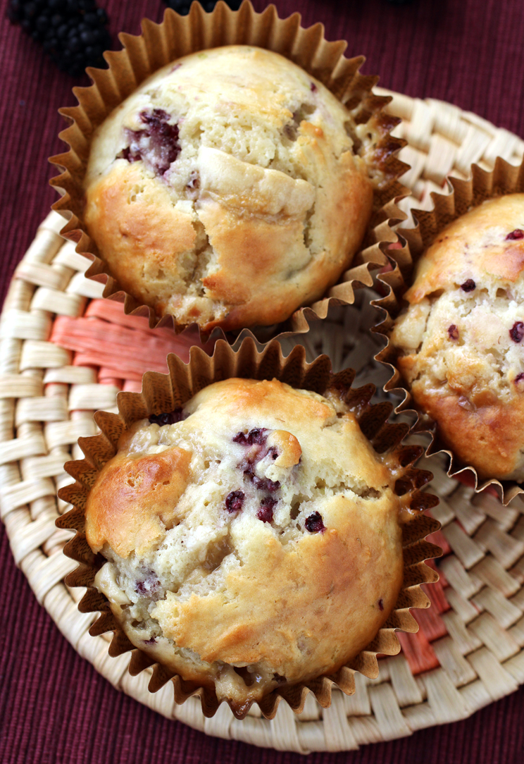 Fresh blackberries, white chocolate, a little bit of yogurt, and a little bit of cream cheese star in these muffins.