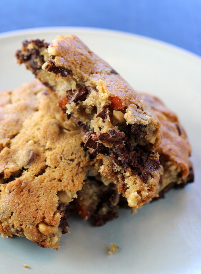 The cookie is chock-full of chocolate, walnuts, pecans, and dried apricots.